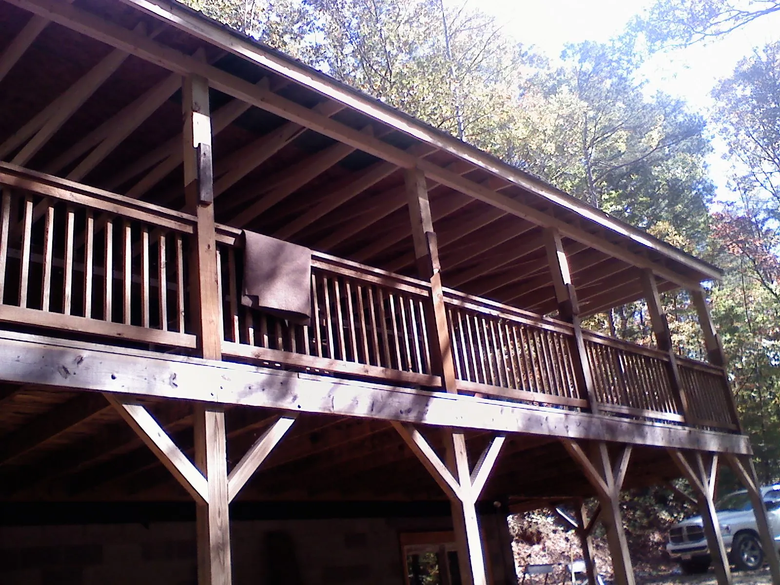 Timber framing under a new elevated porch and deck — Roof Leak Repair in Carbon Cliff by Roofing Brothers